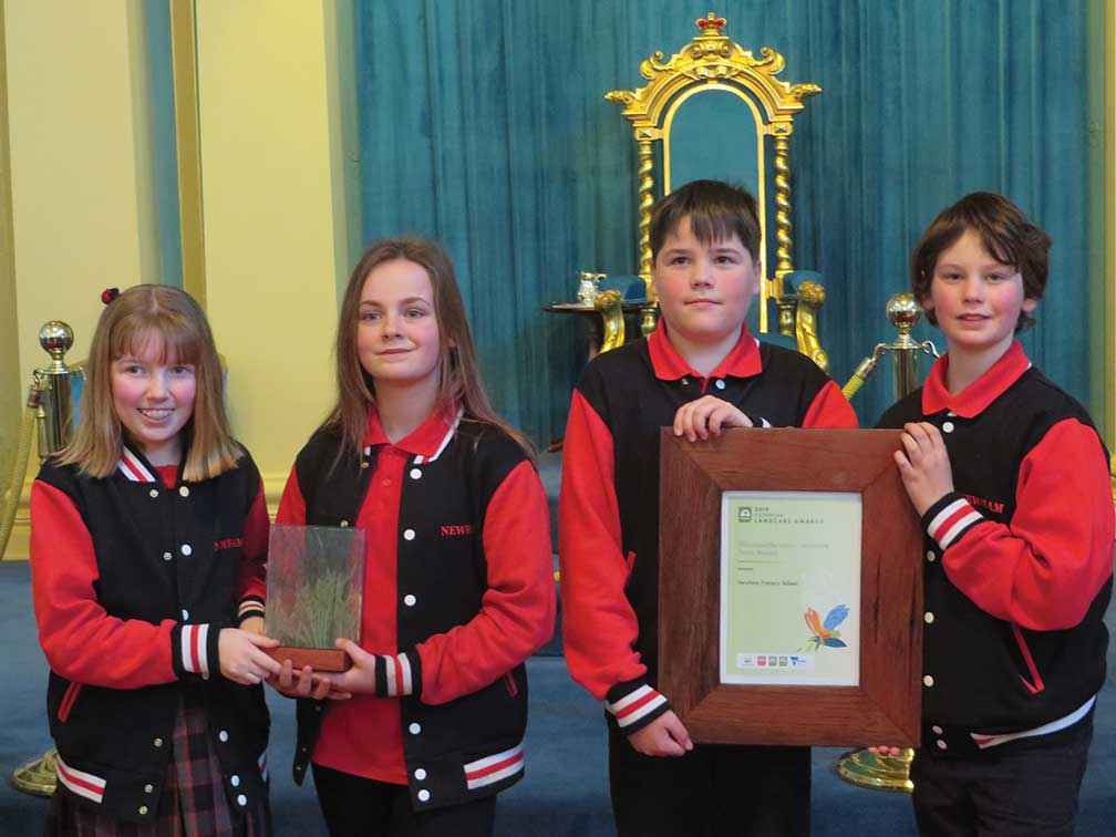 From left, Astrid Le Noury, Abbey Smith, Luke Robertson & Thorsten Perch-Neilsen from Newham Primary School with the Woolworths Junior Landcare Team Award.