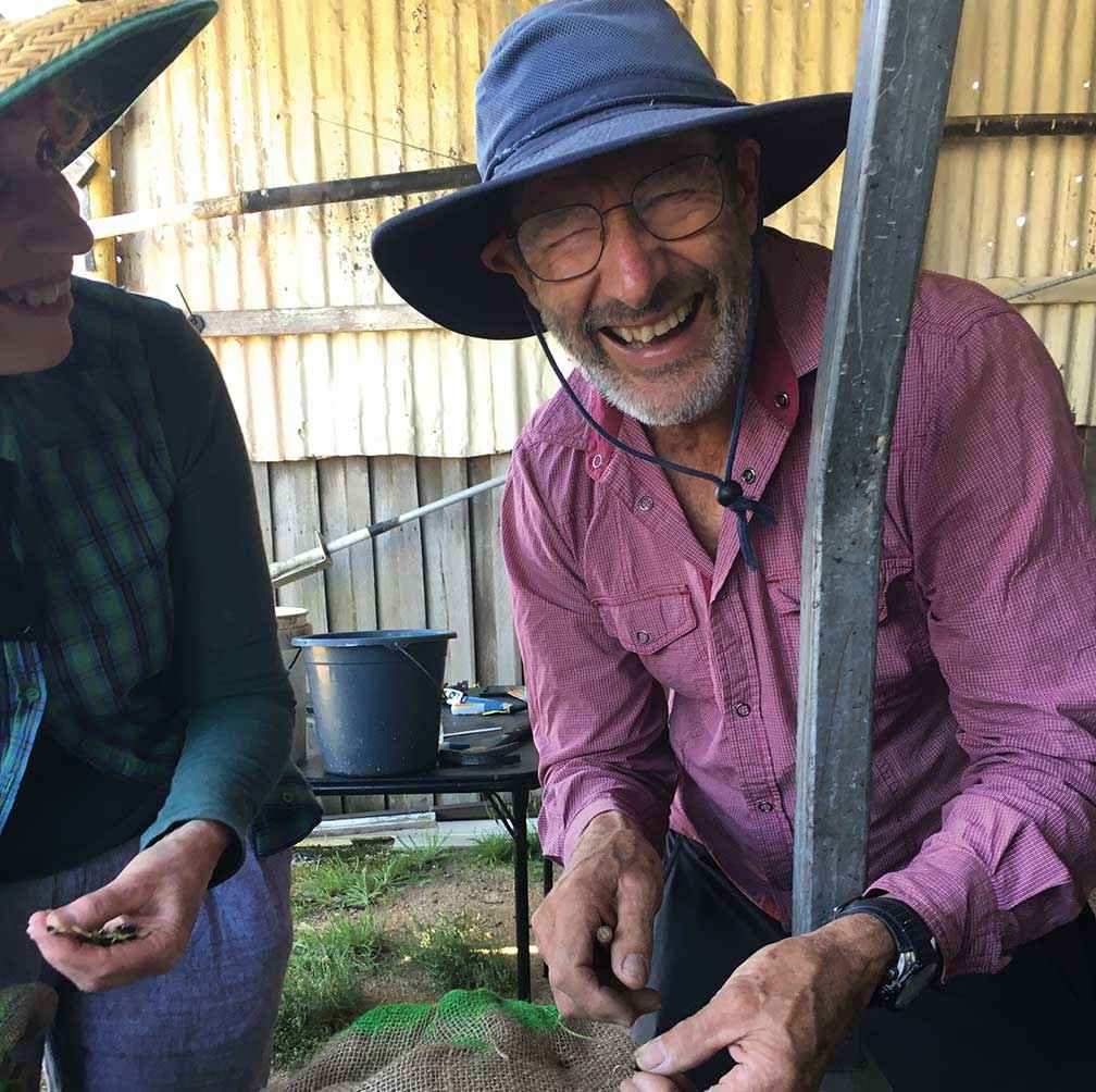 Coastcare volunteer Leo Lubransky worked quickly to get seed sown into sandbags <br />
before it dried out and died.<br />
