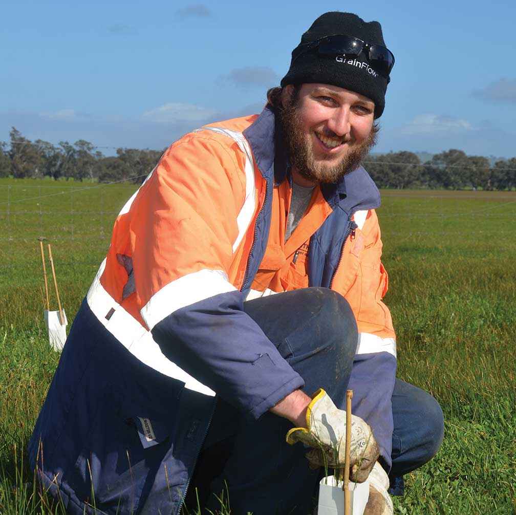 Brett Hawting planting trees at Dumosa in 2017 as part of the DEP.