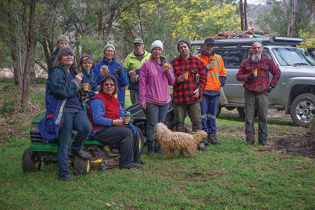Volunteers from The Poet’s Walk Working Group enjoy a hot drink after a working bee.