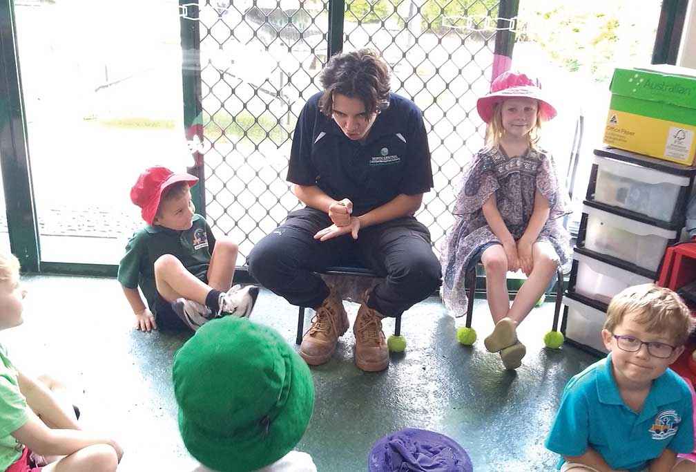 Annalise Varker having fun with the youngsters at Golden Square Kindergarten during a waterbug identification session.