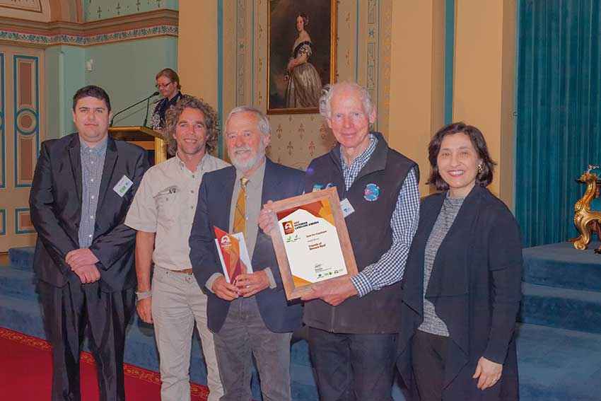 (From left) Dale Tunstall from SureGro with Mike Irvine from Parks Victoria, Don Love and John Ariens from Friends of Beware Reef (winners of the SureGro Coastcare Award) and Minister D’Ambrosio. 